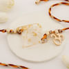 Personalized Resin Initial Rakhi - R Online