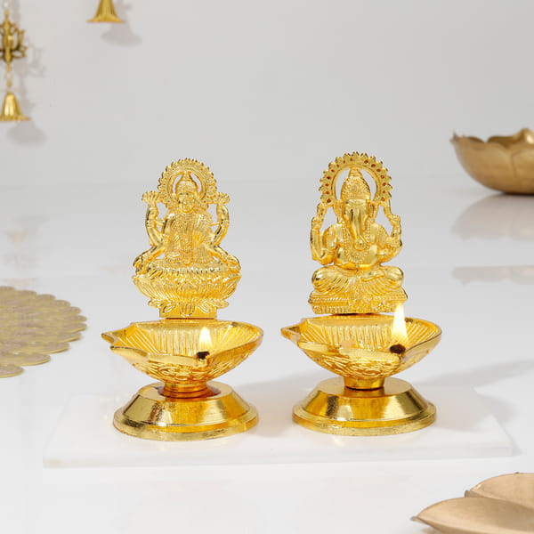 Gleaming Laxmi Ganesha Metal Diyas - Assorted - Set Of 2