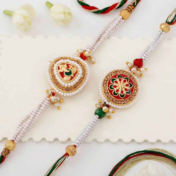 Immaculate Pearl and Meena Rakhi Set Of 2